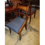 A set of six Regency brass inlaid mahogany dining chairs