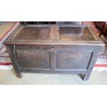 An oak coffer with panelled front, width 105cm, depth 55cm, height 65cm