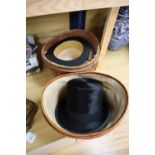 Two Victorian top hats, boxed