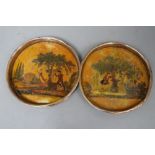 A pair of Continental japanned coasters, diameter 13cm