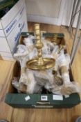 A large quantity of mixed brass candlesticks