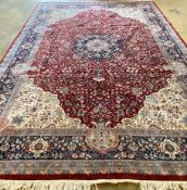 A large Tabriz carpet, 550 x 367cm