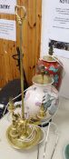 Two Chinese style porcelain table lamps and a gilt metal lamp, tallest 75cm