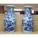 A pair of Chinese vases with dragon design, height 48cm