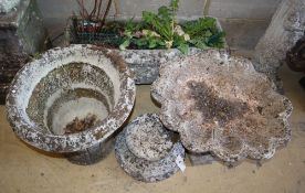 A reconstituted stone trough and five other items (a plinth, two urns, circular planter), planter