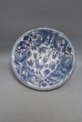 A Hispanic blue and white pottery bowl with a leaping hare, 17th / 18th century probably Talavera or