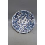 A Hispanic blue and white pottery bowl with a leaping hare, 17th / 18th century probably Talavera or