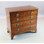 A George III mahogany chest with brushing slide and four graduated long drawers. on bracket feet W.