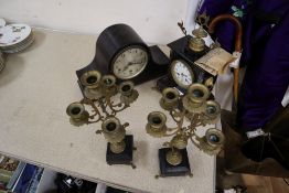 A Victorian black slate clock garniture and a mantel clock