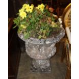 A reconstituted stone garden urn, Height 68cm