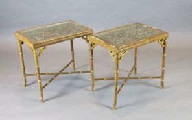 A pair of 20th century lacquered gilt faux bamboo occasional tables, inset with glazed, carved and