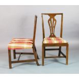 A set of ten George III country Chippendale mahogany dining chairs, with pierced splats and drop