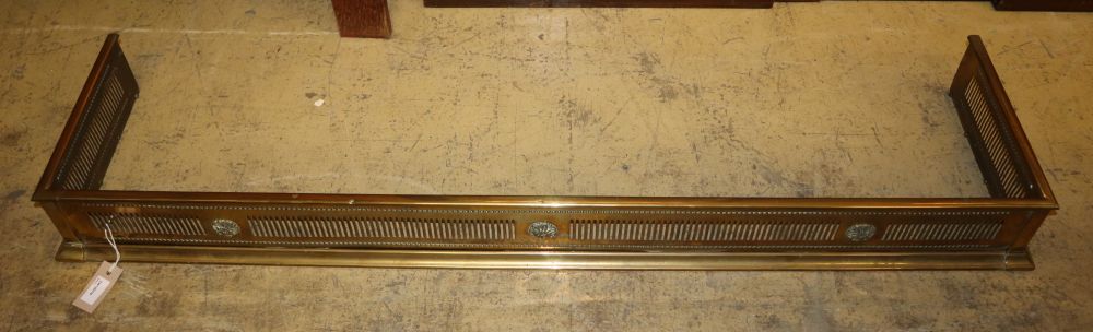 A pierced brass fender, Length 134cm