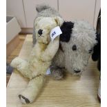 A large English terrier dog and a Chad Valley bear