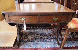 An oval-topped mahogany sofa table, width 93cm, depth 71cm, height 70.5cm