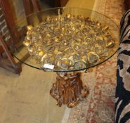 A pair of decorative gilt carved rose base tables with glass tops, width 70cm, depth 70cm, height