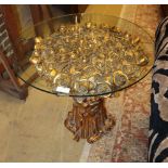 A pair of decorative gilt carved rose base tables with glass tops, width 70cm, depth 70cm, height