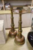 A pair of French brass ecclesiastical candlesticks, height 51cm