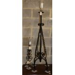 A wrought iron standard lamp, H.118cm and a table lamp