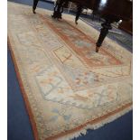 A Caucasian design geometric carpet, 380 x 263cmCONDITION: Generally faded and needs a thorough