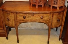 A George III bow front mahogany sideboard - worm to plywood back, width 152cm, depth 62cm, height