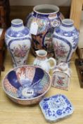 A pair of 18th century Chinese famille rose vases, a similar jug, a Japanese Imari vase and two