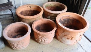 Five terracotta circular campana garden planters, largest width 46cm, height 31cm