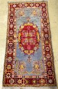 A Turkish rug, 184 x 92cm