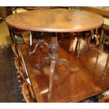 A George III mahogany circular tilt-top table, 84cm