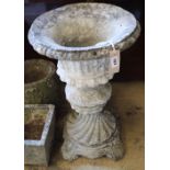 A reconstituted stone urn on plinth, width 40cm, height 63cm