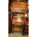 A Georgian mahogany three-tier whatnot, with lectern top and two drawers, Width 48cm