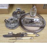 A plated snuffer tray, a spirit flask, a pair of chamber sticks and sundries