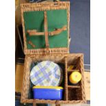 A modern Jacques croquet set, cased and a picnic set in a wicker basket with bottle compartments