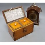 A George III satinwood tea caddy, width 19cm, and a mahogany mantel clock