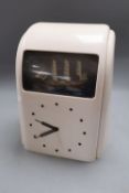 A Vitascope white bakelite 'ship' automaton electric clock, height 30cm