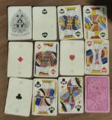 A c.1880s pack of standard playing cards by WOOLLEY & Co. 51 cards. Missing 4 of Spades.