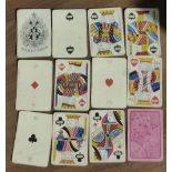 A c.1880s pack of standard playing cards by WOOLLEY & Co. 51 cards. Missing 4 of Spades.