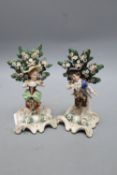 A pair of Meissen style figures of a young girl and boy, height 16cm