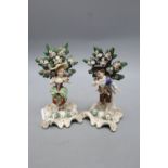 A pair of Meissen style figures of a young girl and boy, height 16cm