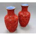A pair of Chinese cinnabar lacquer vases, height 23cm