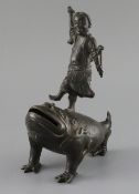 A late Ming bronze joss stick holder of Lui Hai standing on the back of a three legged toad, width