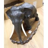 A Japanese Meiji bronze elephant, signed, length 42cm