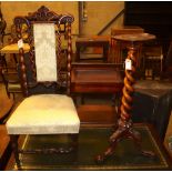 A Victorian carved walnut prie dieu chair and a walnut candle stand on barleytwist column