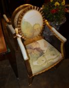 A pair of gilt French armchairs