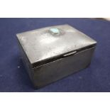 A Liberty & Co. Tudric pewter and turquoise mounted cigarette box, width 11cm