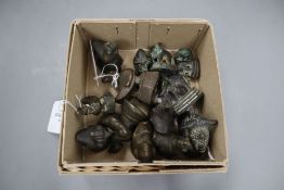 A set of six Asian graduated bronze elephant opium weights and another set of eight modelled as