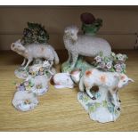 A pair of Derby sheep and a group of Staffordshire pottery animals, etc.