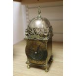 A mantel timepiece in the form of a brass lantern clock, height 26cm