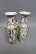 A pair of Chinese famille rose vases, 19th century, height 25cm