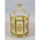 A Victorian style ormolu hall lantern, with foliate scroll and ivy leaf frame, inset with frosted